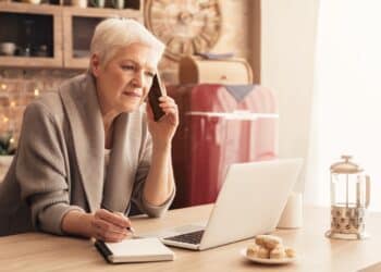 Senior Businesswoman Using Laptop, Talking On Cellphone And Taking Notes While Working From Home Sitting In Kitchen SSUCv3H4sIAAAAAAAACpxWS47bMAzdF+gdAq8ngCX/e5VBF4rEJMLIkiHJEwSDuXvpOE5tMUCK7iL6hY9/8uvnj90uO4igZfZr9zW98K2NGUP0ImpnUZy/3eUerAK/loDS0XktzFp4EFGeregBhXY0ZhJ/3z5mIYo4BggT2V0kRYQT6piFDxWzRe/ze7d8uH3Ef+CnLHtbycJ4uMkW0az8v/45//i9eCNOYOX1ZvDKEQ8GxOzI+wzNPi4RfL/2QoIxayeyOu+qNksIImC0nHGnOQRrdMV4ihZqNHELa3jVpDBt0RgLCZJ1nKXIsxiGa8LL6iqFfWhMKtgNsGB5l6fACxxek0rXDyNauEGyvOYdIR5c0FF/QhrIvCZKxSixbsTWyJqxtkuhzmMha3vaIDvOK0IPBpEmCVDDa+LSEXphtlZ2ddUQaukwNf3gvPCJVs7bgqCxhIazs/C6jrBQ1WszleshxG1zIXXOSAkZ0GH0W2KW55xmcwAbcFQk6XxKf0b6RCNrG9oTwnyk6alZ1ZUkPmcAfxxJm+Uk7h6i9kmEmoYXpMNOXljVu3hO/WFtSYIk5JPazDlhV8gtcVRuU940Vdc+N7QHG1/bKt1w3YVByK0JbVu1T0aCcs6TEUM7uMcZneR9yiXBOaNIAZP+CWC1+4fCwLawGKF546wNLDhpdGeNTjvi2ZS5uD4ZBtiRLfHDiCG6IXGFFSQxA7jBkFzn5dPhksIqQvusrcuSBLB3qM2+nhSPNXJ9vUSkMCZtL4ZAOv4UfOqkuNCZmmgMvfCResRZW9NKxOnfj1bjNqbp5hQeRikhpIVb0ol1GAPWBUV2pDKsi+myxQIimbx4XD10DNWPilxdBGJU2q2W/6fDKE8cxQo0eC1nhcv5s8yZx83gRhtvYwKD1y2XSmacG8ThVn1HVAt/t3cI+I+pEW/yFZfEG871K6rF6fv9kym8vKYnKzivy7otce03eVc0zR0wX2tnjXpuFi2K8C0/tFpfcXqyIINjWyopq72ou2pfFs1x31VS7KtOHLnKGT8ogaH7/gMAAP//AwCjGHYUdwoAAA==