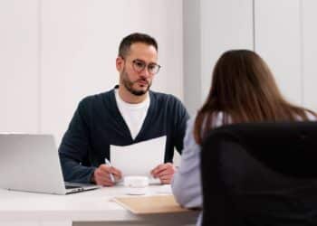 Employee Investigation: Female Employee Meeting Police For Disciplinary Interview