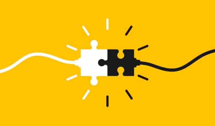 Two jigsaw pieces connecting, AMP partnership